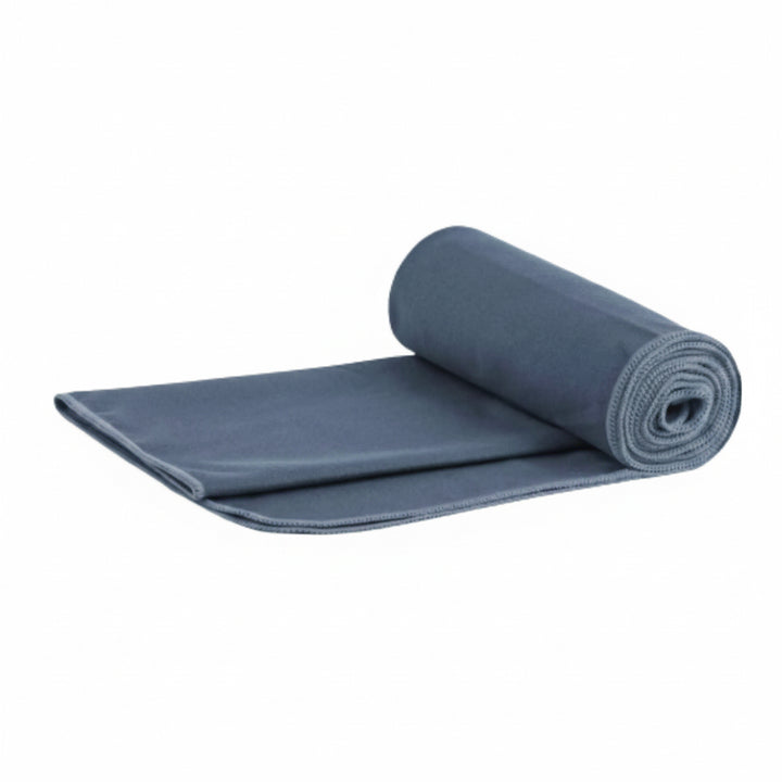 Grey microfibre travel towel part rolled with the loose end folded open on a white background