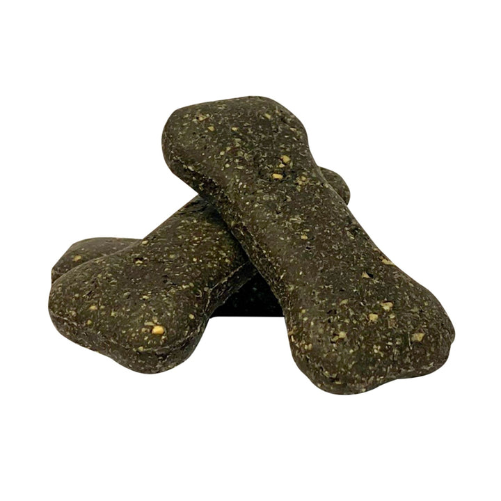 Two dark charcoal bone-shaped dog biscuits with flecked texture, stacked on a white background