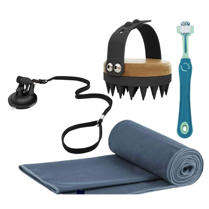 Grooming kit laid out: suction bath harness, bamboo scrubber brush, teal toothbrush and rolled towel