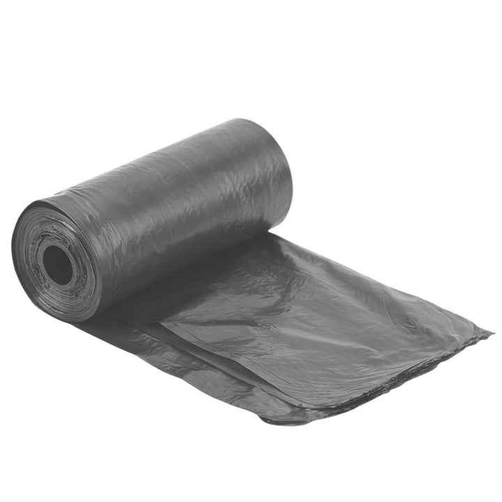 A part-unrolled roll of black plastic dog poop bags on a white background