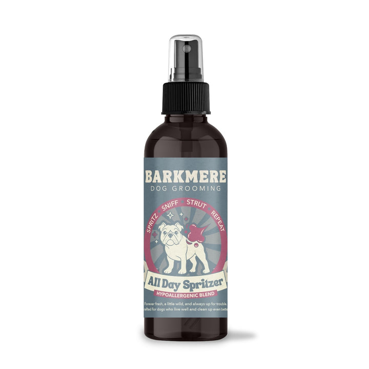 Barkmere All Day Spritzer Hypoallergenic Blend in an amber spray bottle with a slate blue label