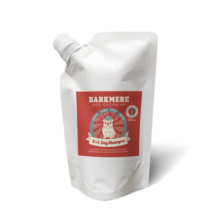 White 250ml refill pouch of Barkmere 2 in 1 Dog Shampoo with a red label and white screw spout