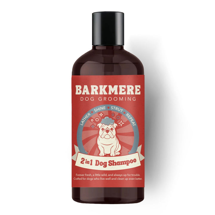 Barkmere 2 in 1 Dog Shampoo in an amber bottle with a black cap and red bulldog label, front view on white